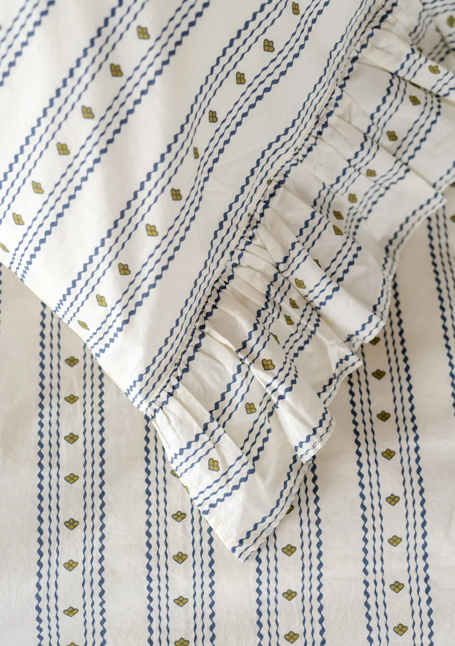 Pair of Cotton Pillowcases in Navy Ditsy Floral - Image 3