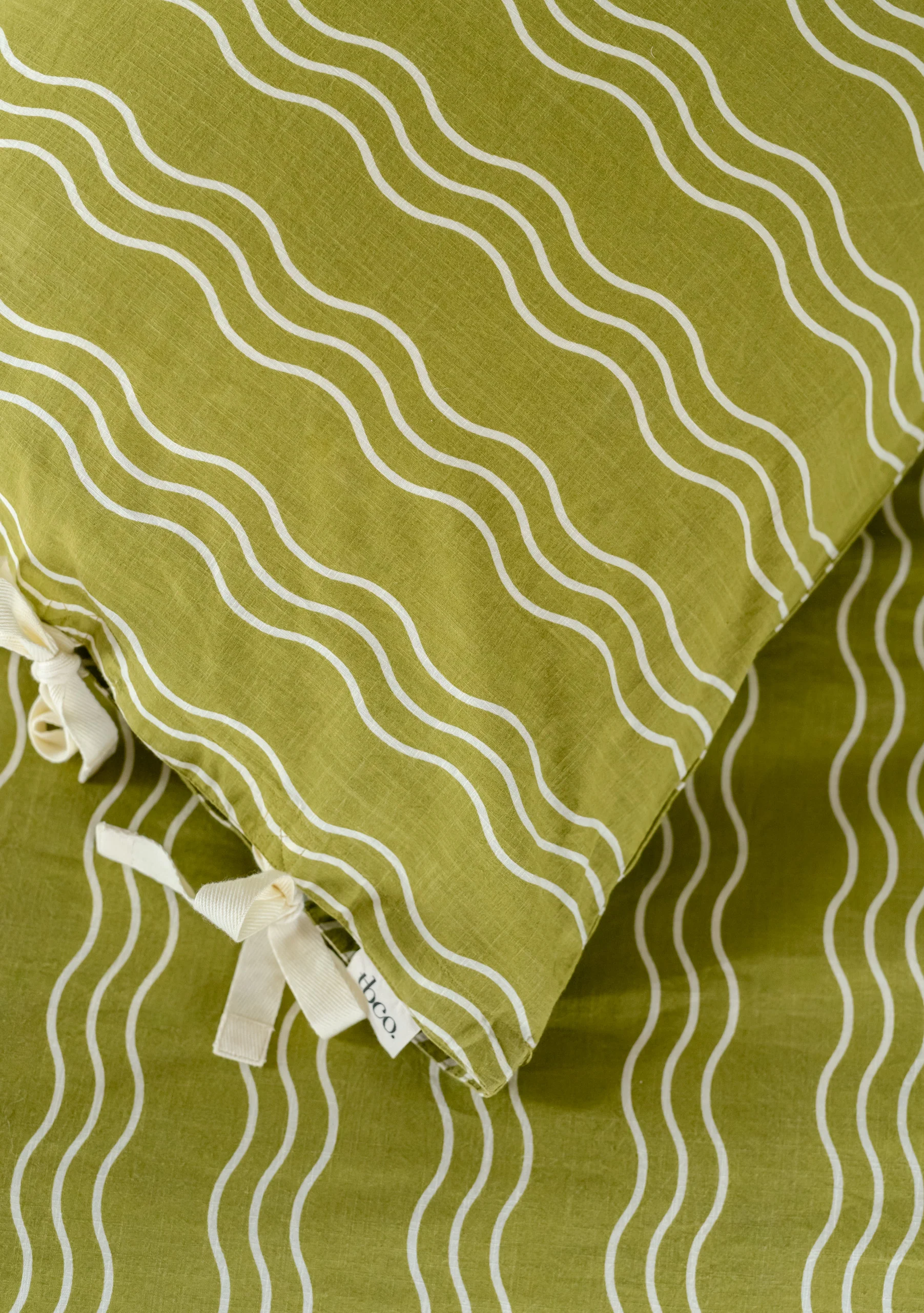 Pair of Cotton Pillowcases in Olive Wave - Image 4